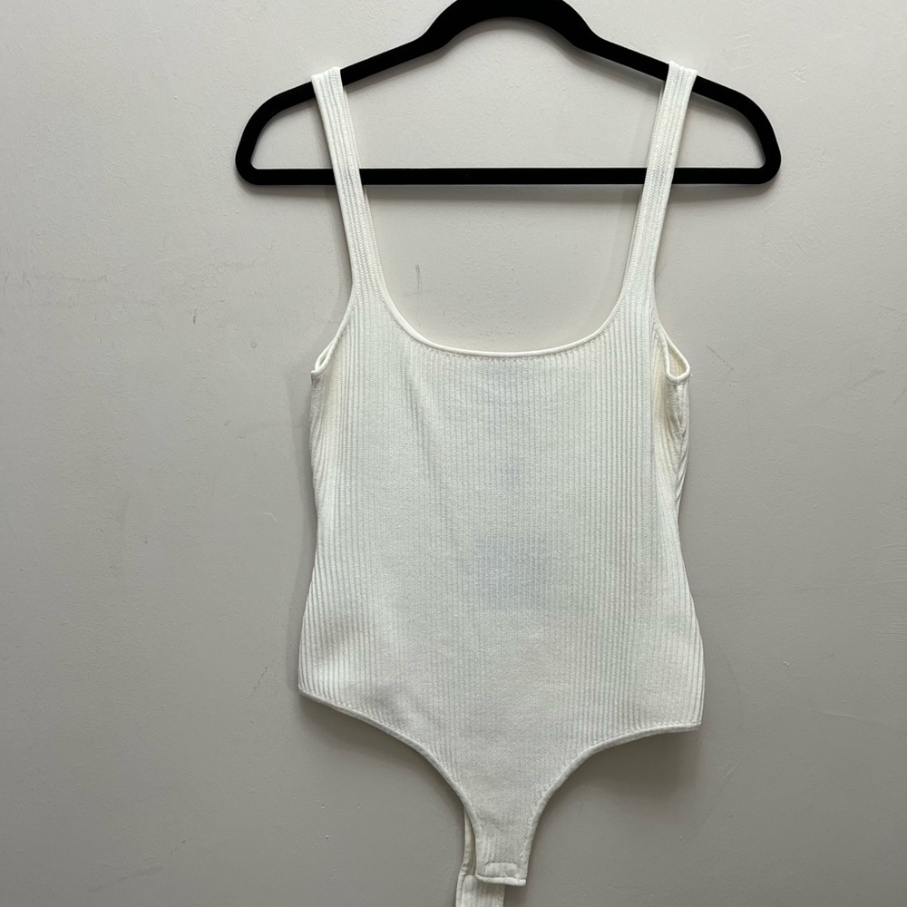 White body suit- never worn